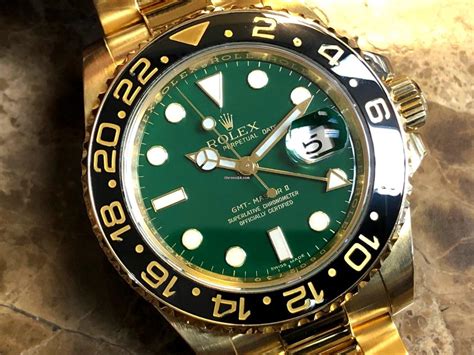 rolex gmt-master ii gold 116718 green|rolex 116710 price.